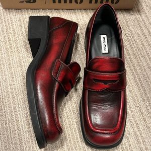 Miu Miu leather mocasin loafers in red distressed color